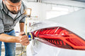 Fix Minor Dents and Dings on Your Car with These DIY Tips